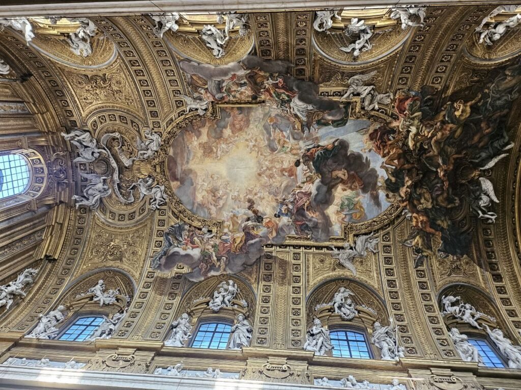 Famous ceiling fresco inside the Church of the Gesù in Rome
