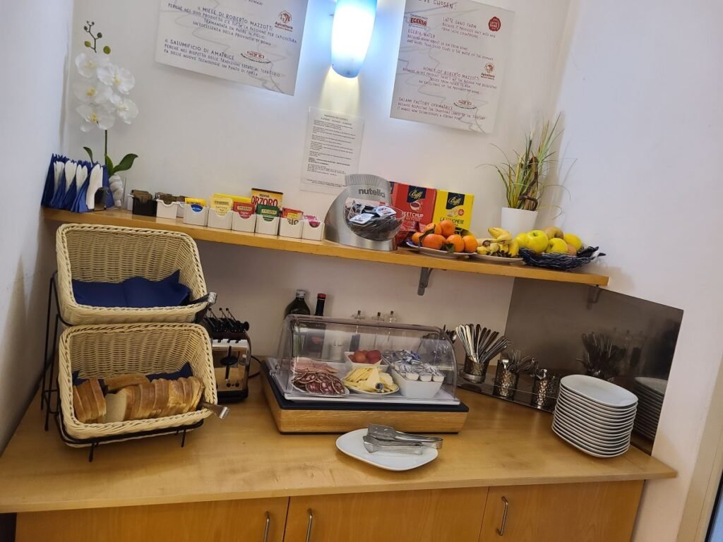Cheese, salami and tea served at breakfast