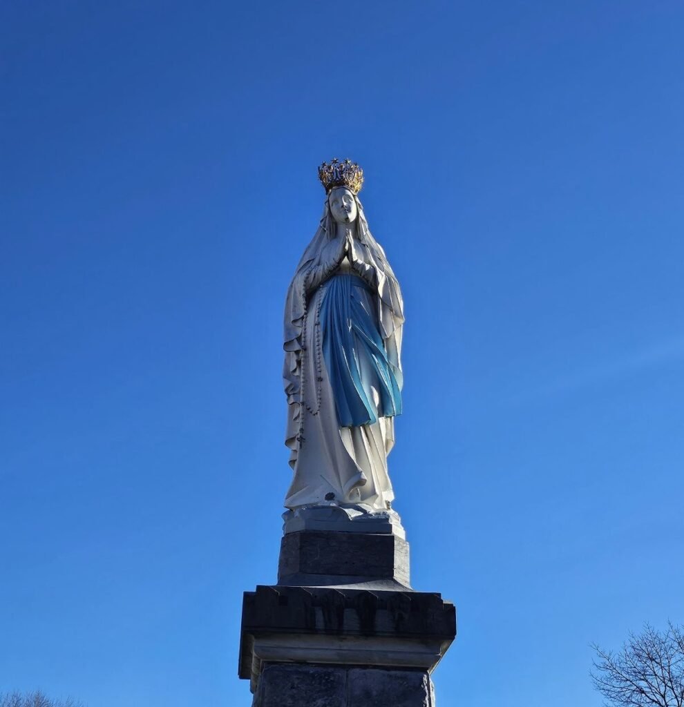 Crowned Virgin statue at Lourdes France Sanctuary