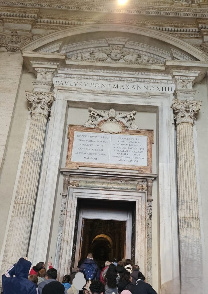 Pilgrims entering St. Peter's Basilica through the Holy Door