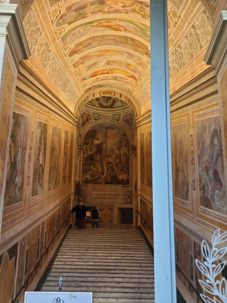Frescoed side staircase inside the Scala Santa in Rome
