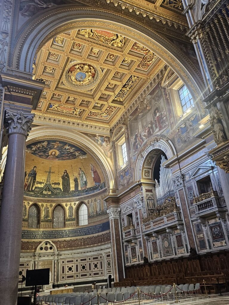 Golden apse mosaic inside the Basilica of St. John Lateran
