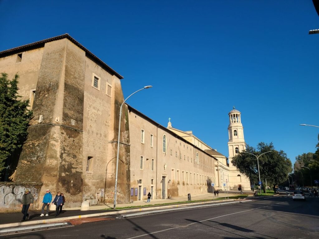 Exterior of St. Paul Outside the Walls under a blue sky in Rome